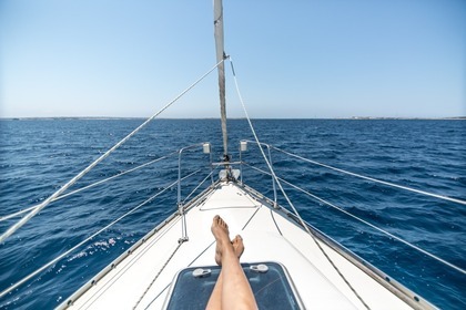 Sailboat with moorage in Ibiza town