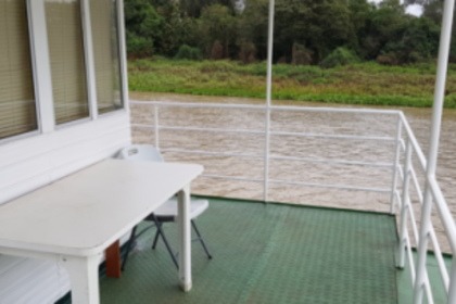Relax aboard this houseboat in Pantanal