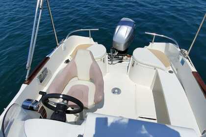 Rental Motorboat Quicksilver 510 Cruiser Roses