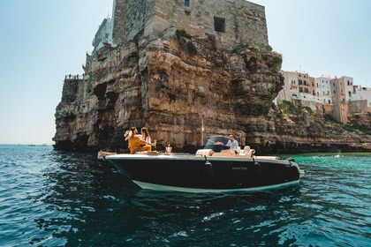 Hire Motorboat Invictus Yacht Elegant tour with Champagne Polignano a Mare