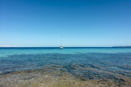 Sailboat with moorage in Ibiza town