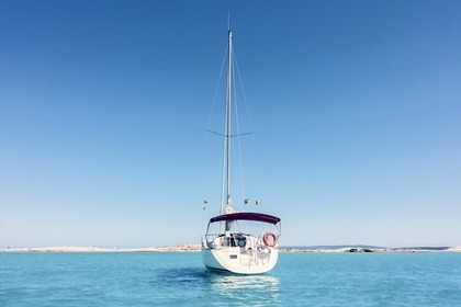 Sailboat with moorage in Ibiza town