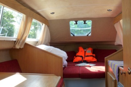 Enjoy gliding on the water with this house boat of