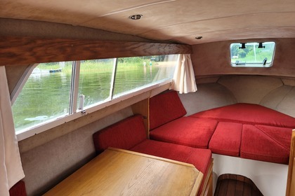 Enjoy gliding on the water with this house boat of