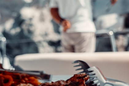 Private Caldera Cruise with Power Catamaran ENJOY incl. Meal & Drinks