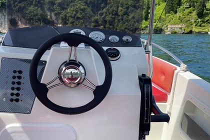 Explore Lake Como in Style – Trimarchi Boat for 7, No License Needed!