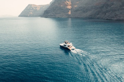 Private Caldera Cruise with Power Catamaran ENJOY incl. Meal & Drinks
