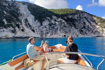 SUNSET PRIVATE  BOAT  TRIP -FTERI-KAMARI-AMIDI