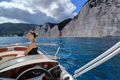 SUNSET PRIVATE  BOAT  TRIP -FTERI-KAMARI-AMIDI