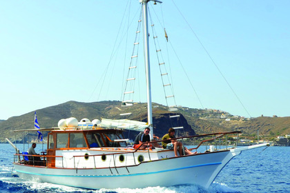 Traditional Kaiki for daily cruises in Santorini!