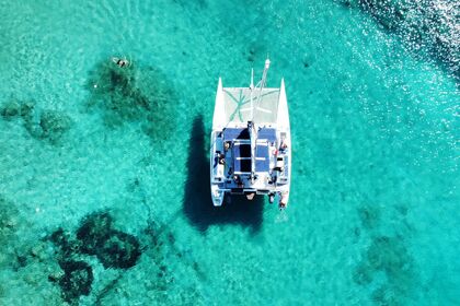 Hyra båt Katamaran Toxic Boat Escursione giornaliera all inclusive Porto Pozzo