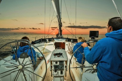 Sail in Santorini's attractions with our Bavaria 44