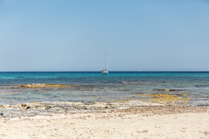 Sailboat with moorage in Ibiza town