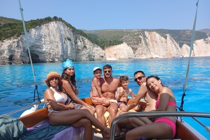 SUNSET PRIVATE  BOAT  TRIP -FTERI-KAMARI-AMIDI