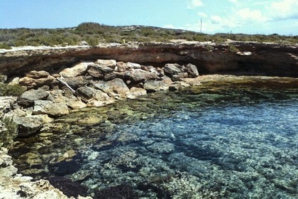 Sailboat with moorage in Ibiza town