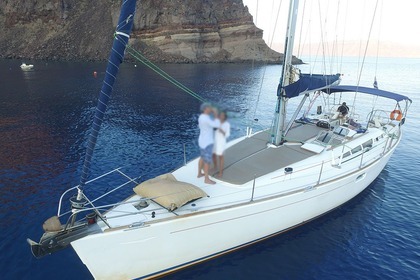 Discover Santorini's hidden gems with Odysseas sailboat