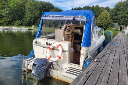 Enjoy gliding on the water with this house boat of