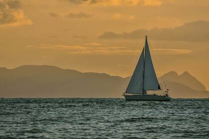 Sail in Santorini's attractions with our Bavaria 44