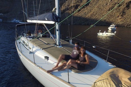 Discover Santorini's hidden gems with Odysseas sailboat