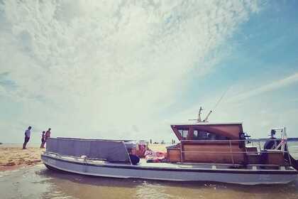 Location Bateau à moteur Ducros Bateau bac chaland Lège-Cap-Ferret