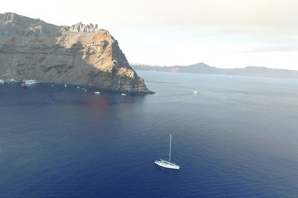 Discover Santorini's hidden gems with Odysseas sailboat