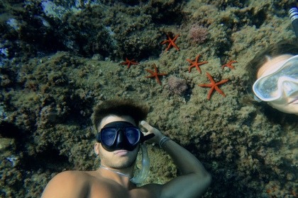 Procida: Excursion en bateau avec plongée en apnée et photos sous-marines